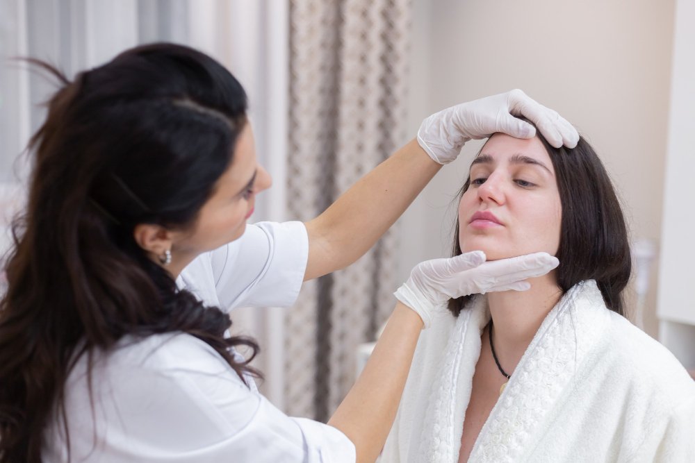 Is Non-Surgical Skin Tightening in Dubai Worth It? – Lakeshore Aesthetic & Wellness Center, Dubai Woman receiving professional Acne Scar Treatment in Dubai for smoother and clearer skin at a modern aesthetic clinic.