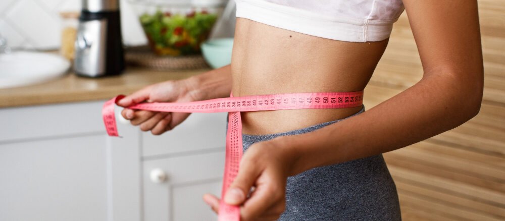 Woman receiving professional Weight Loss Treatment in Dubai at an aesthetic clinic