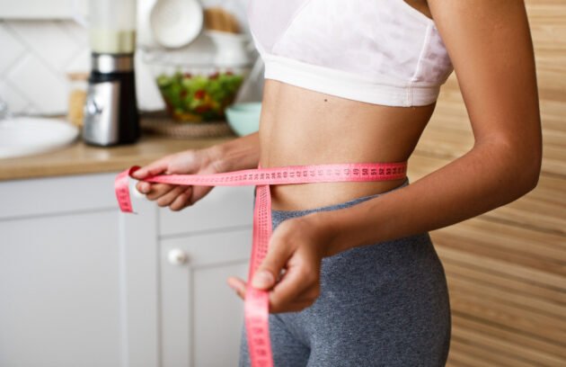 Woman receiving professional Weight Loss Treatment in Dubai at an aesthetic clinic